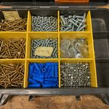 Photo of a labeled compartment organizer full of fasteners