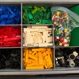Photo of sorted LEGO bricks in a storage bin